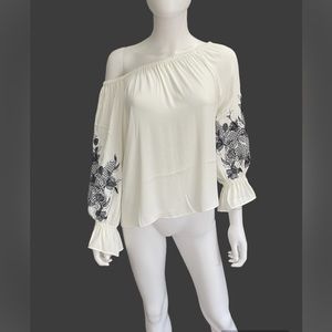 New White House Black Market blouse with embroidered sleeves